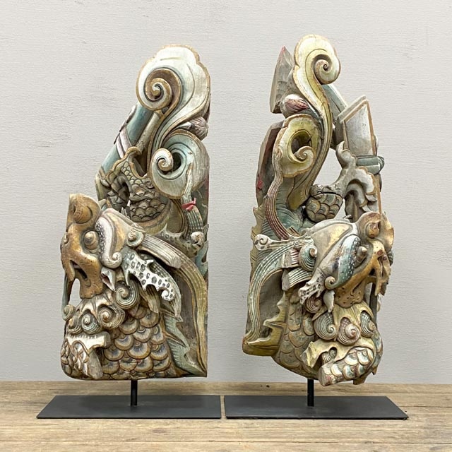 Pair of decorative wooden fish with dragon heads