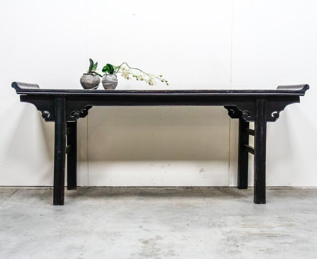Elegant dark lacquered altar table