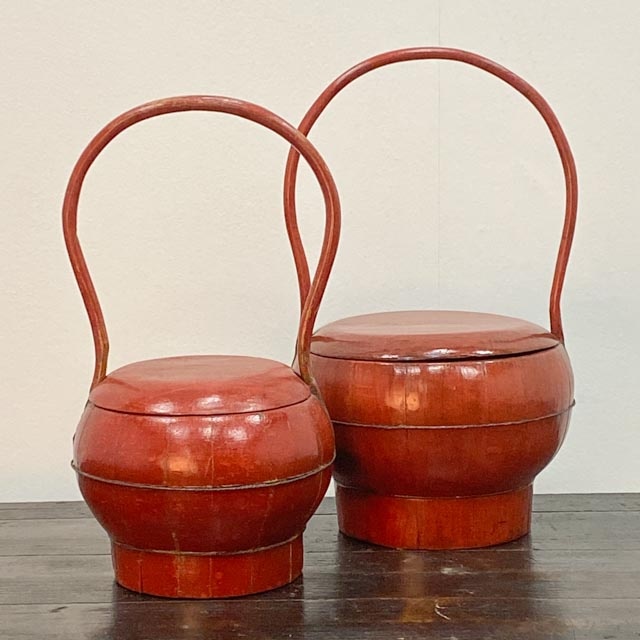 Large red wooden basket with handle