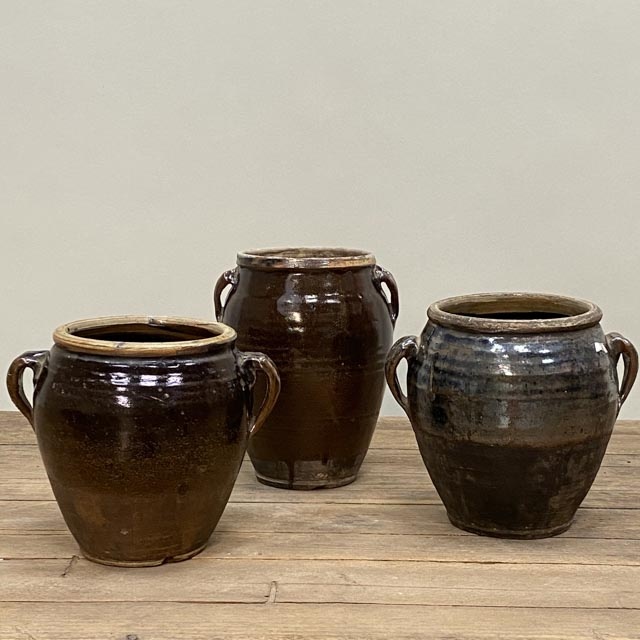 Black glazed pots with thick ears