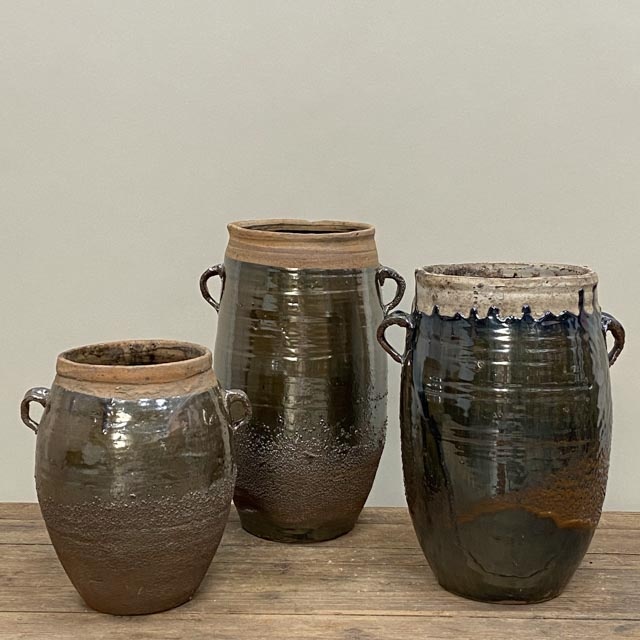 Tall storage pots with unglazed rim