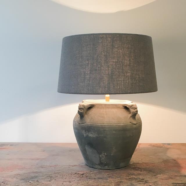 Medium sized grey pottery lamp with 4 lion ears