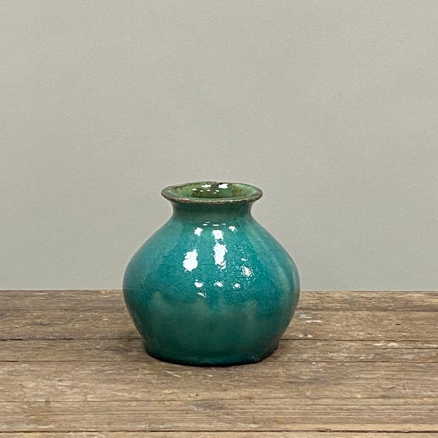 Small turquoise blue vase