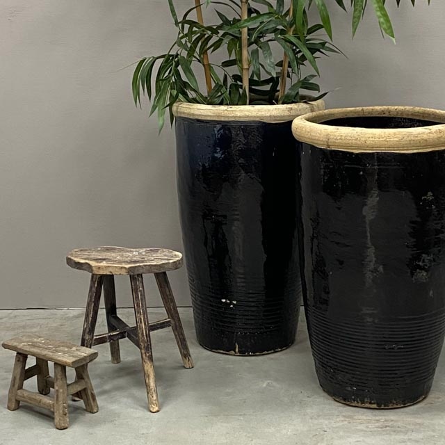 Tall dark glazed planter pot