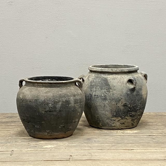 Round unglazed grey pots