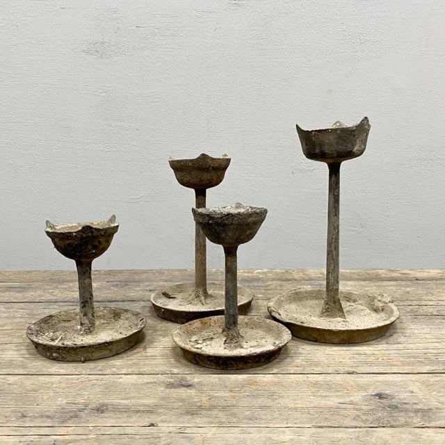 Short antique candle holder with metal base