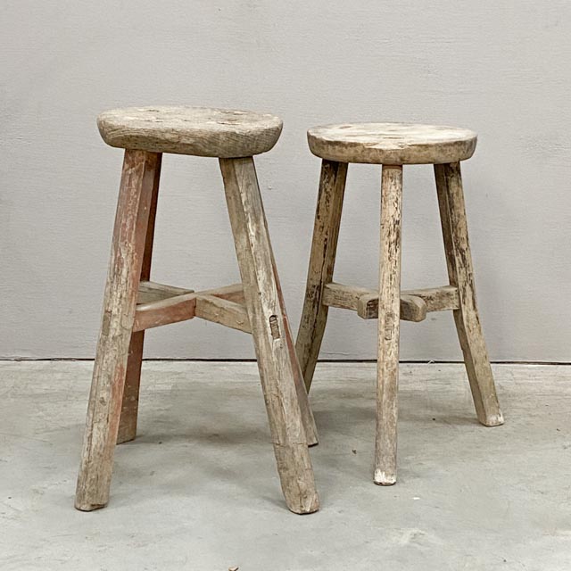 Weathered round wooden stool