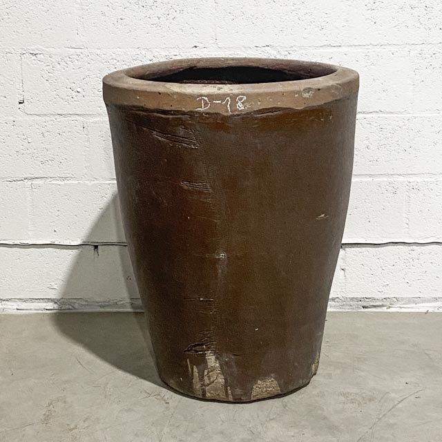 Single tall brown ceramic planter
