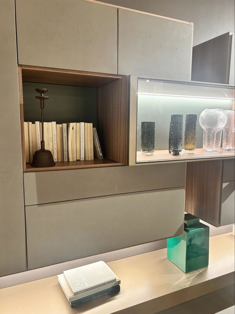Detailed view of our candle holders and newly made vases in Presotto’s modern cabinets, enhancing the chic ambiance.